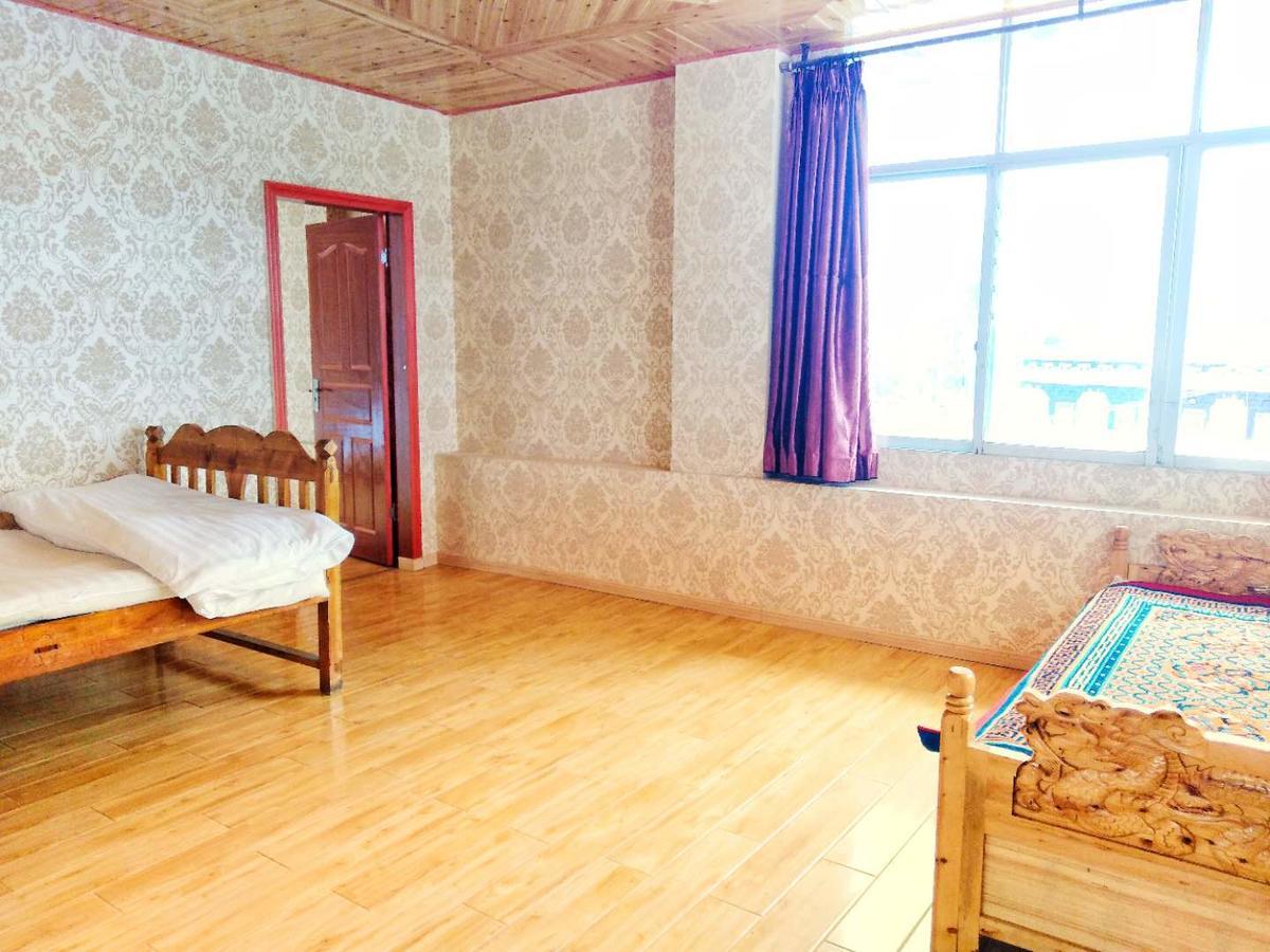 Zishuo Zihua Guest House Daocheng Extérieur photo