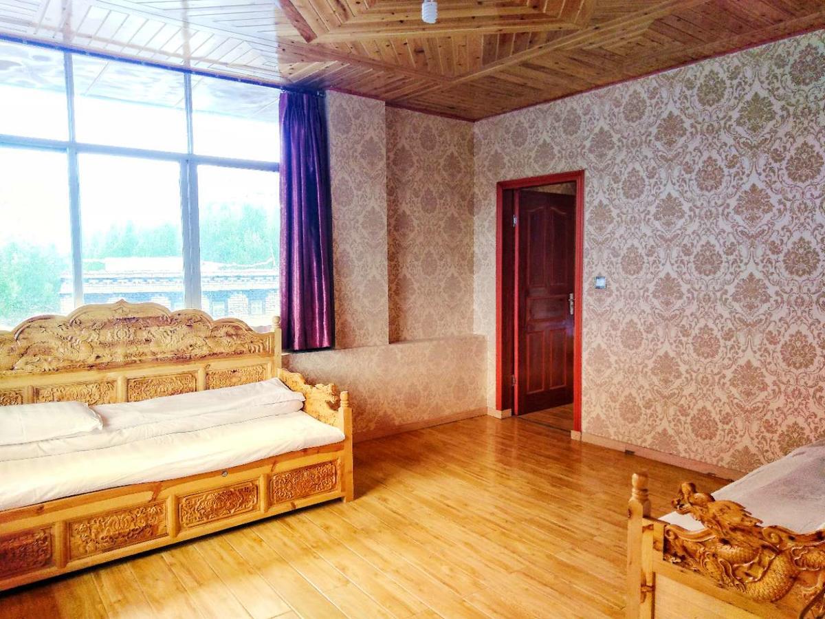 Zishuo Zihua Guest House Daocheng Extérieur photo