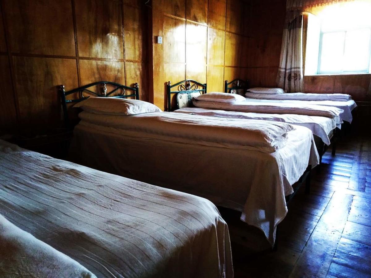 Zishuo Zihua Guest House Daocheng Extérieur photo