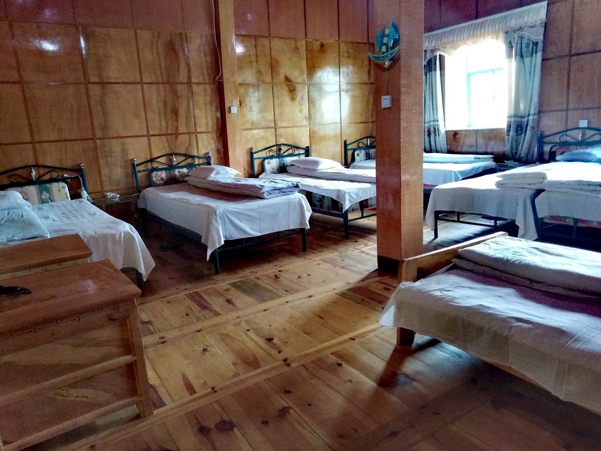 Zishuo Zihua Guest House Daocheng Extérieur photo