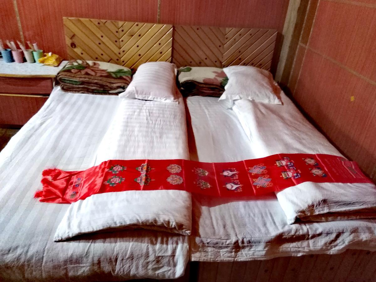 Zishuo Zihua Guest House Daocheng Extérieur photo