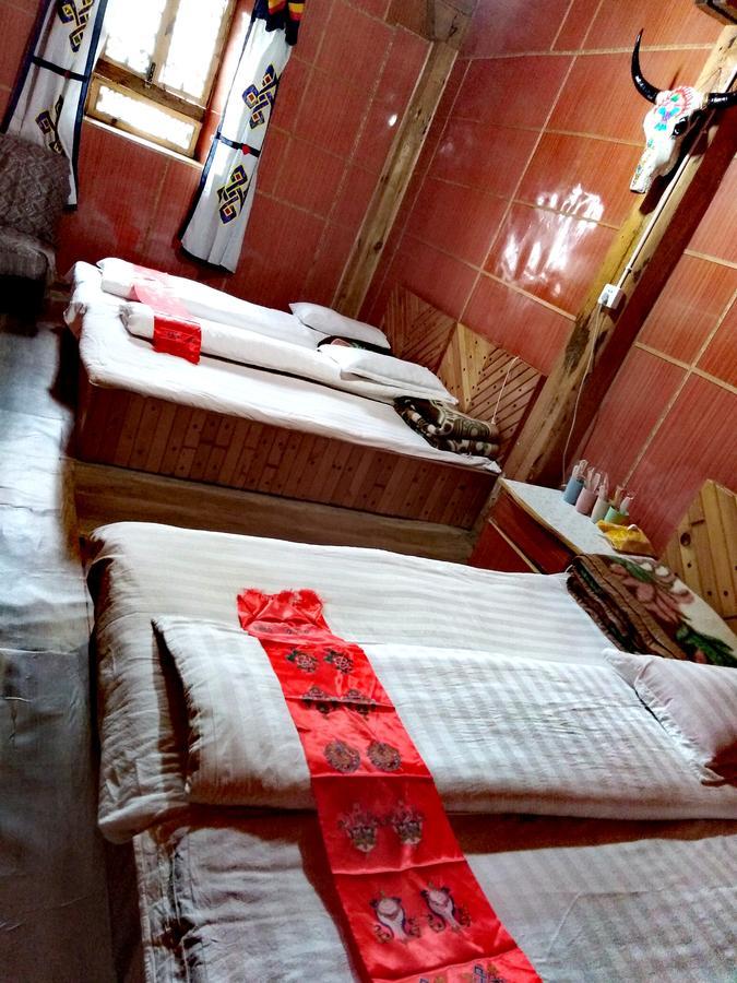 Zishuo Zihua Guest House Daocheng Extérieur photo