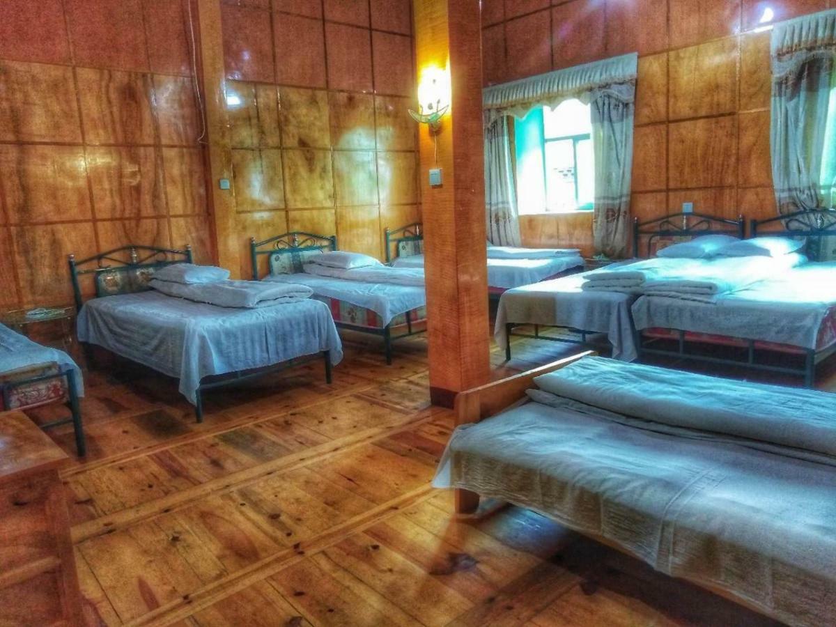 Zishuo Zihua Guest House Daocheng Extérieur photo